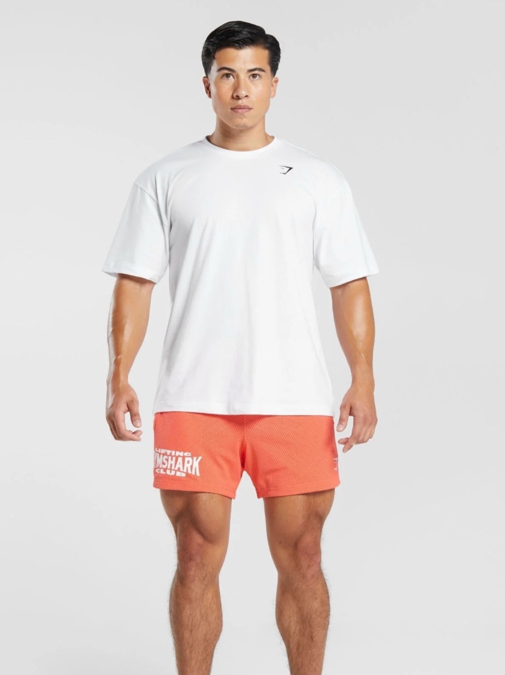 Gymshark Coral-Orange Mesh 5” Shorts